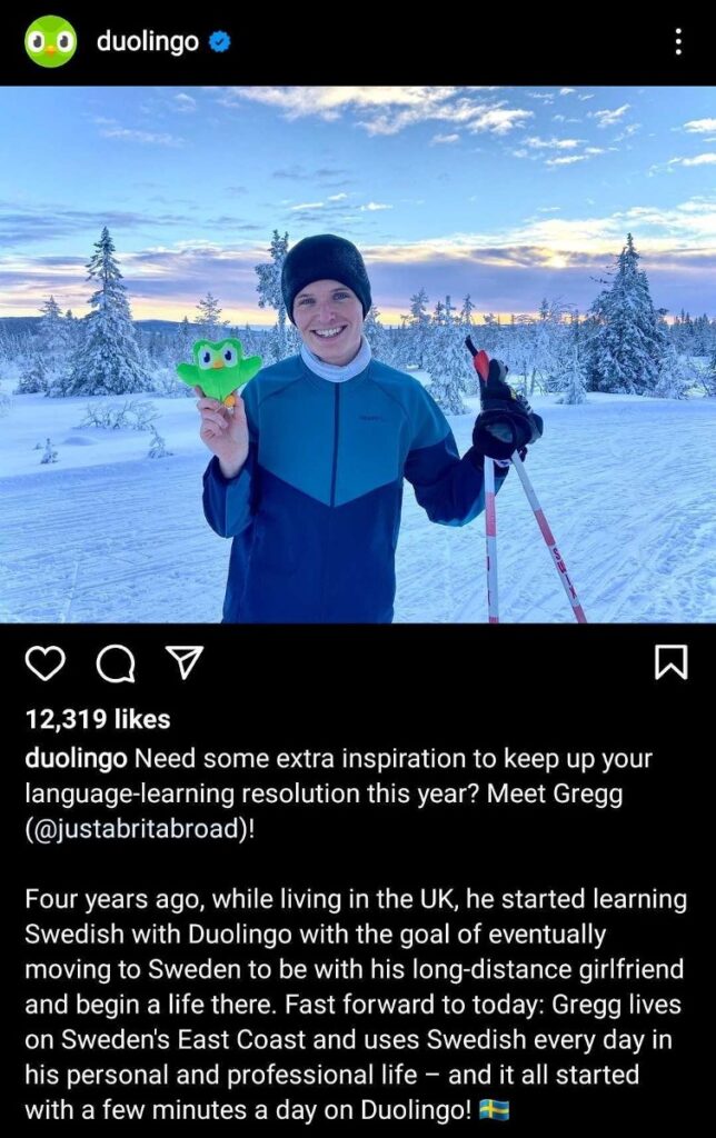 A photo posted by Duolingo of @JustABritAbroad with a snowy background. Description reads how he had a goal to move to Sweden and used Duolingo to learn the language before finally moving to Sweden's East Coast! 